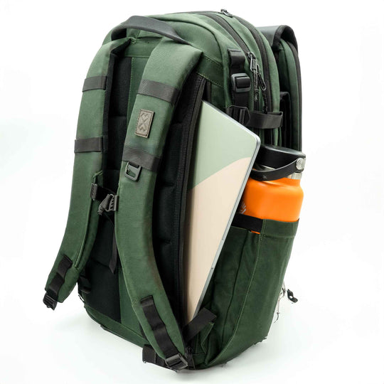 The Adventure Proof Diaper Bag has a 15" laptop sleeve and large water bottle pocket making it one of the best diaper bags for outdoors and traveling