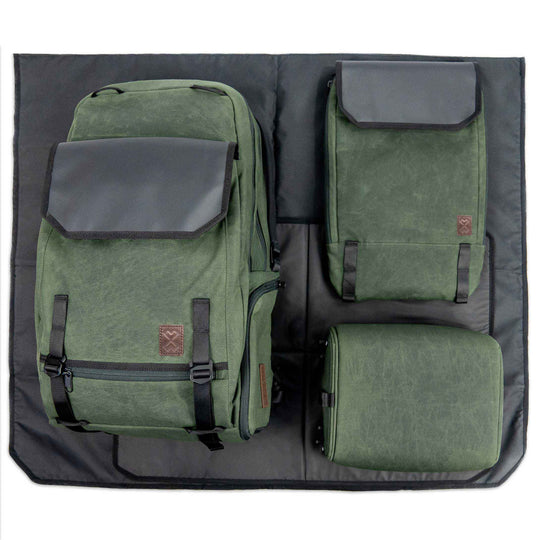 Adventure Proof Diaper Bag Milk x Whiskey is a complete diaper backpack system which has a cooler, changing pad, ground cover blanket and is the best diaper bag for mom and dad.