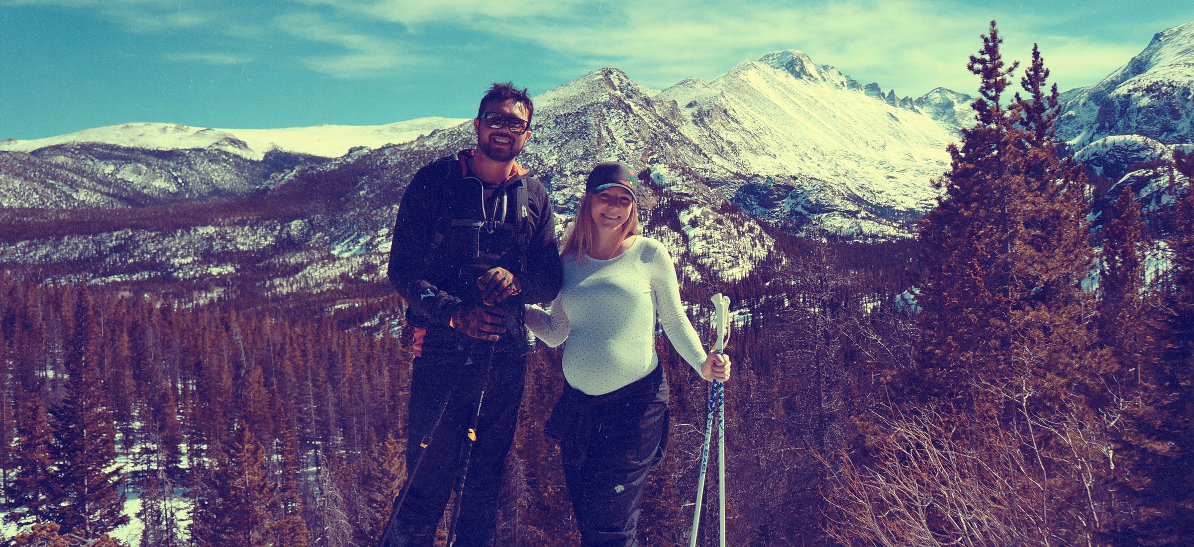Milk x Whiskey - Created with Love of the outdoors - A soon to be young couple, mother is pregnant, snow hiking in the mountains. Ready for the next greatest Adventure.