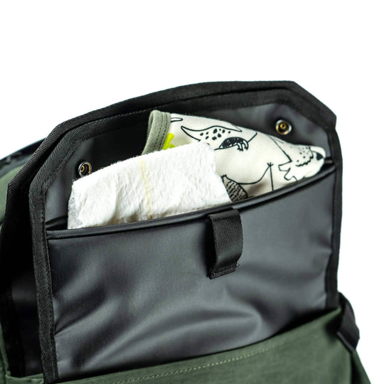 The Backpack has an Odor sealing packet for baby messes and accidents. It is water proof and cleanable.